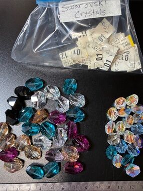 Swarovski Mixed lot of Crystal faceted  Beads in Teal, Purple, Clear, Amber